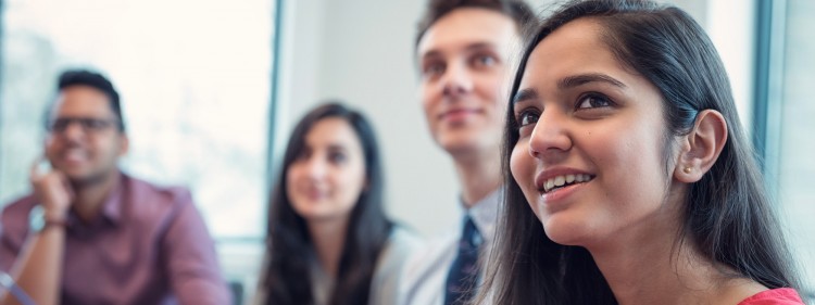 Bachelor of Commerce students watch a presentation together