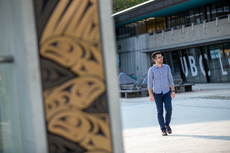 Student with Indigenous art