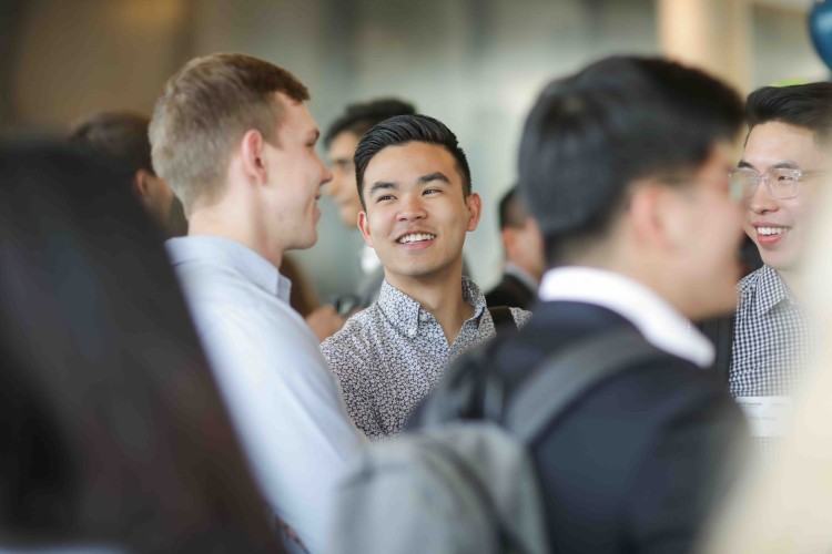 students chatting in a crowd