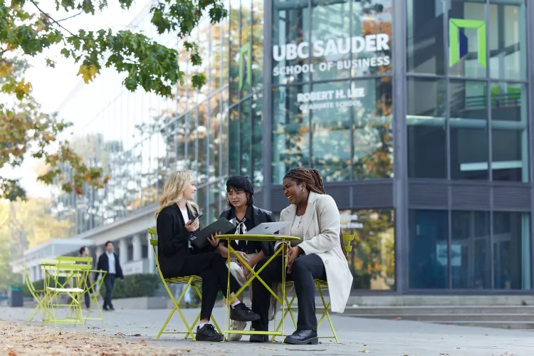 Sauder stock image with three students