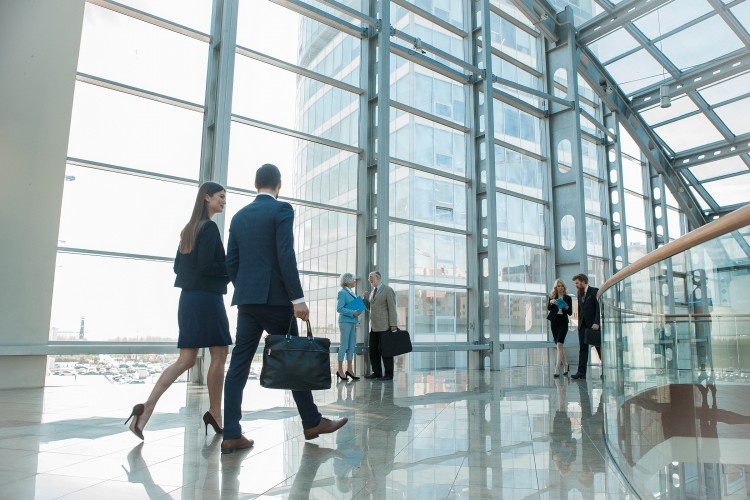 Business people walking in a modern building